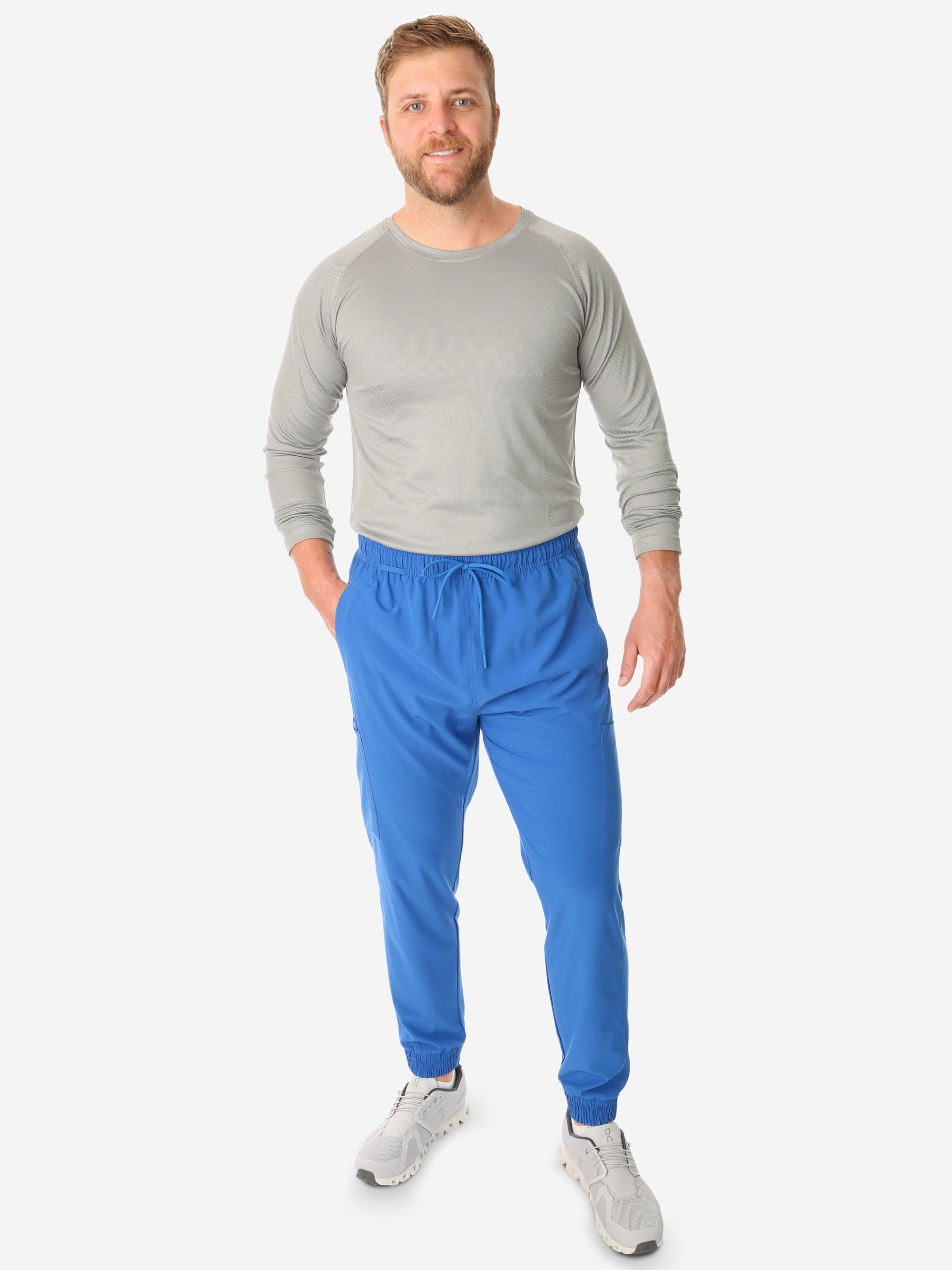TiScrubs Stretch Men&#39;s Royal Blue Jogger Scrub Pants and Long-Sleeve Underscrub Gray Full Body Front