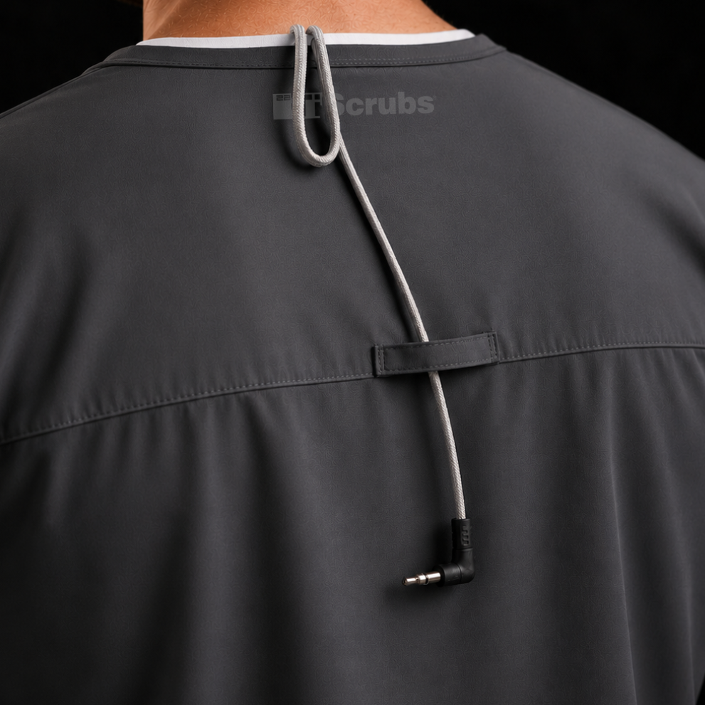 Integrated loupe cord holder on a men's charcoal gray TiScrubs scrub top