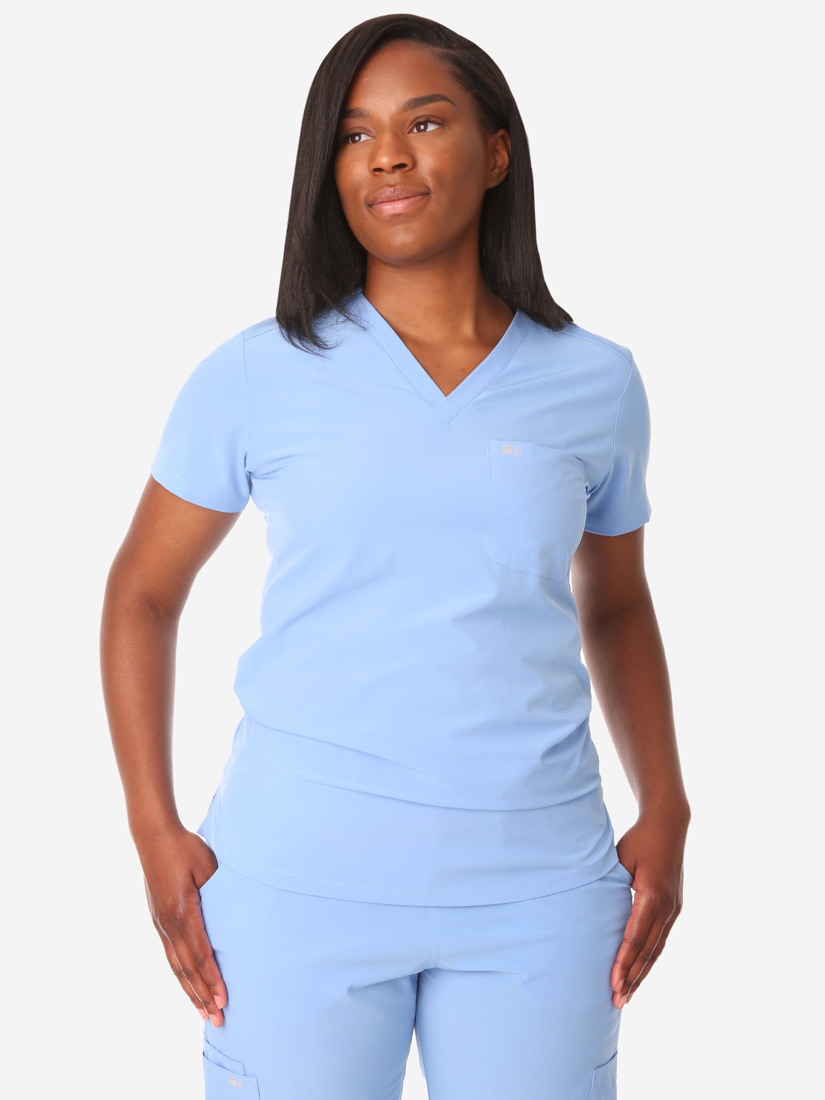 TiScrubs Women&#39;s Stretch Ceil Blue One-Pocket Tuckable Scrub Top Untucked  Top Only Front