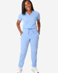 TiScrubs Women's Stretch Ceil Blue One-Pocket Tuckable Scrub Top and 9-Pocket Pants Tucked  Full Body Front
