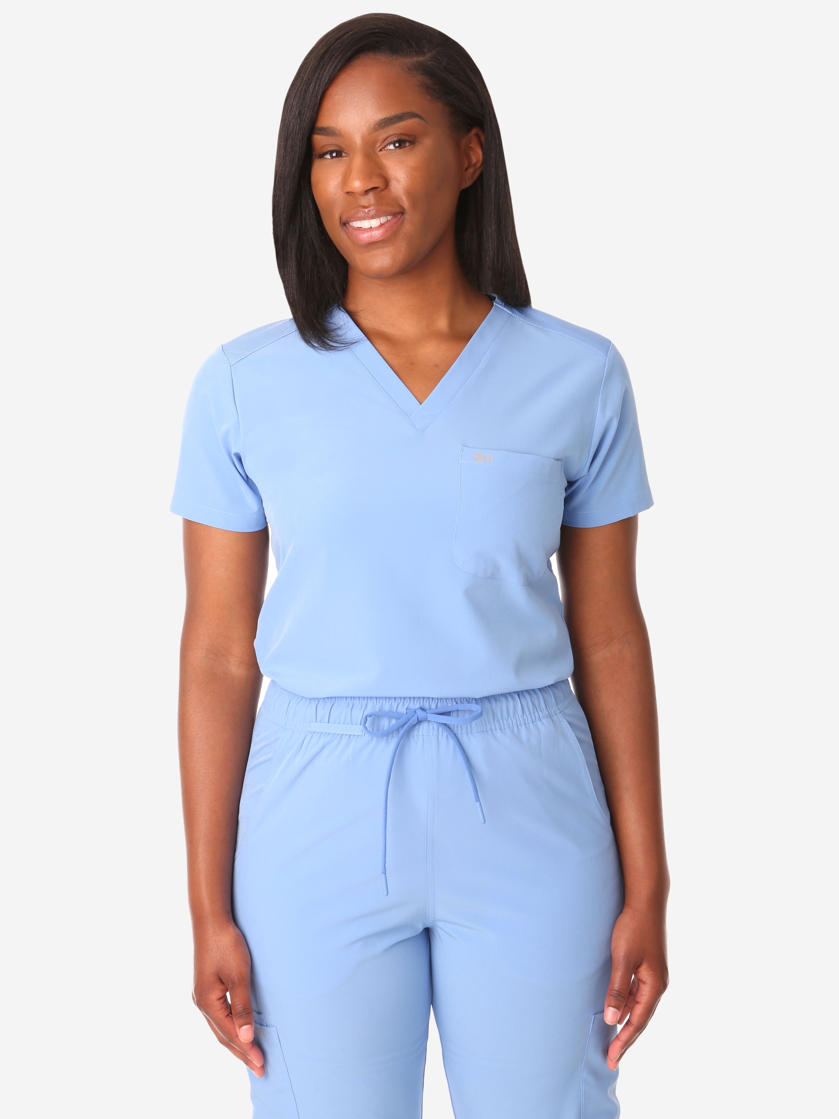 TiScrubs Women&#39;s Stretch Ceil Blue One-Pocket Tuckable Scrub Top Tucked  Top Only Front
