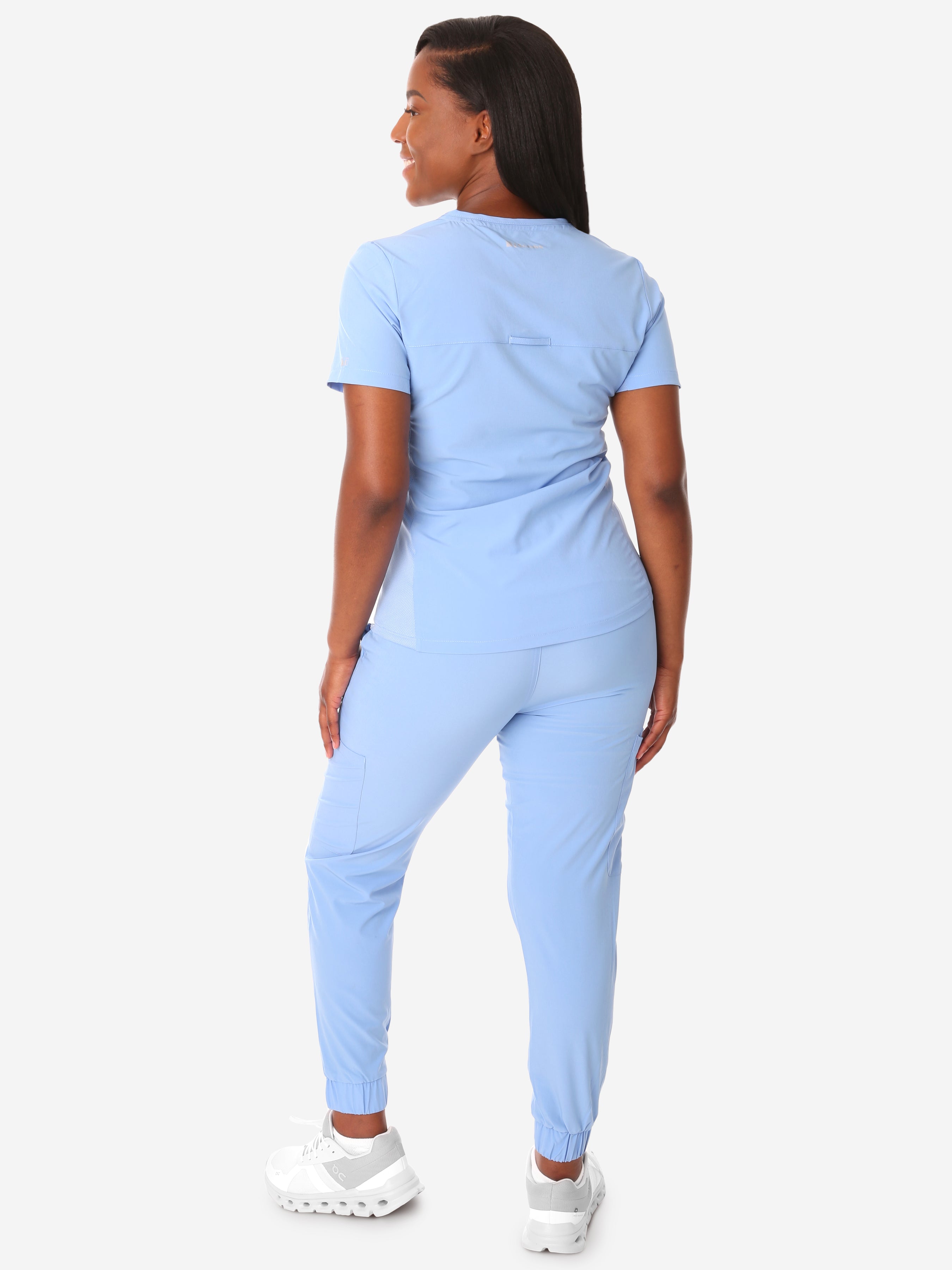 TiScrubs Ceil Blue Women&#39;s Stretch Perfect Jogger Pants and One-Pocket Tuckable Top Back View Full Body