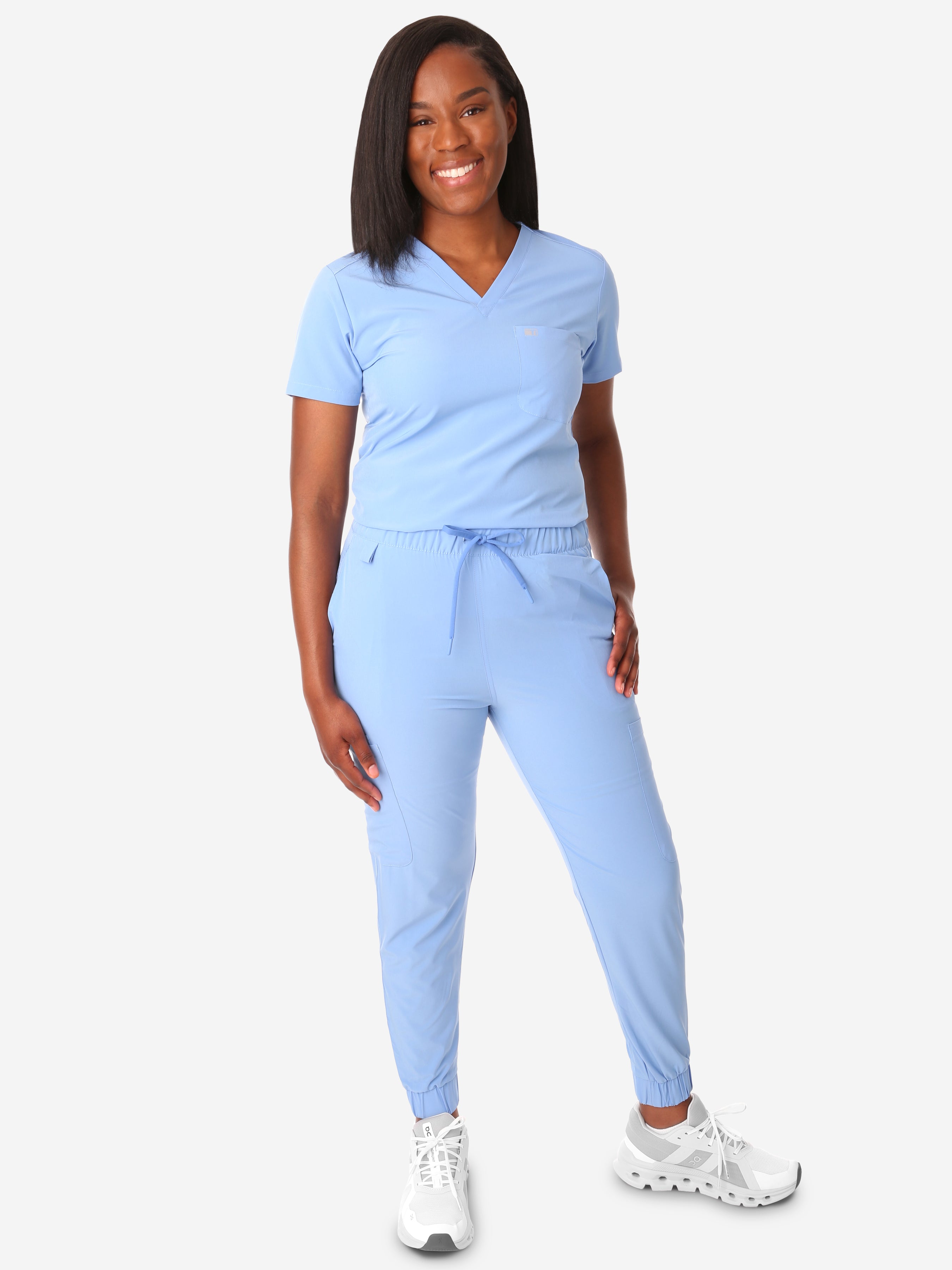TiScrubs Ceil Blue Women&#39;s Stretch Perfect Jogger Pants and One-Pocket Tuckable Top Front View Full Body