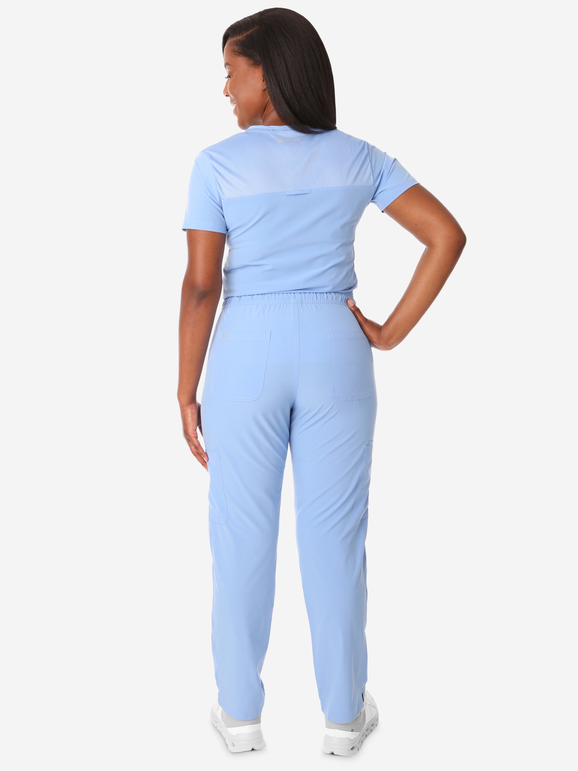 TiScrubs Ceil Blue Women&#39;s Stretch 9-Pocket Pants and One-Pocket Tuckable Top Back View Full Body