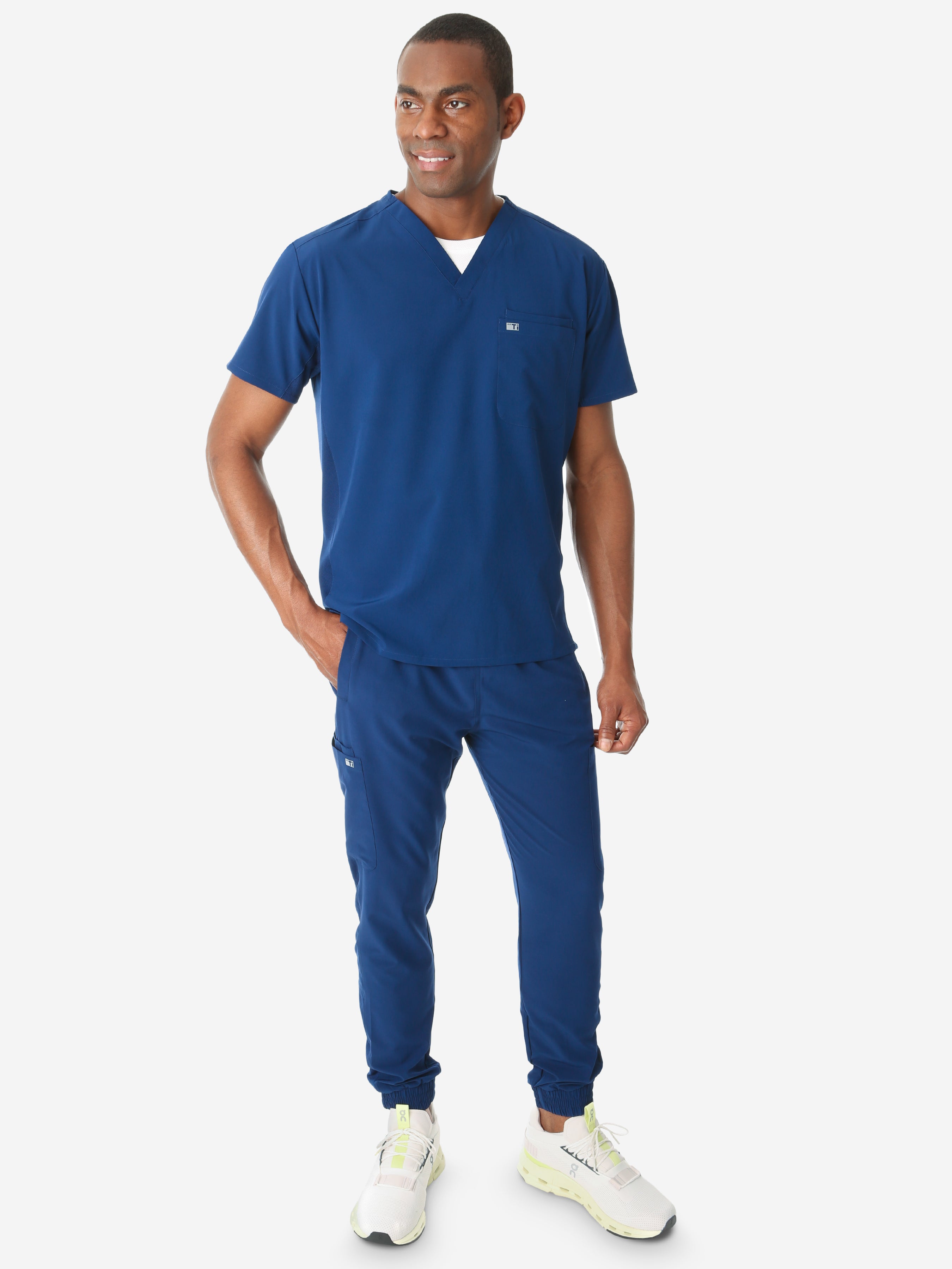 TiScrubs Stretch Navy Blue Men&#39;s Jogger Scrub Pants and Double-Pocket Top Untucked Full Body Front