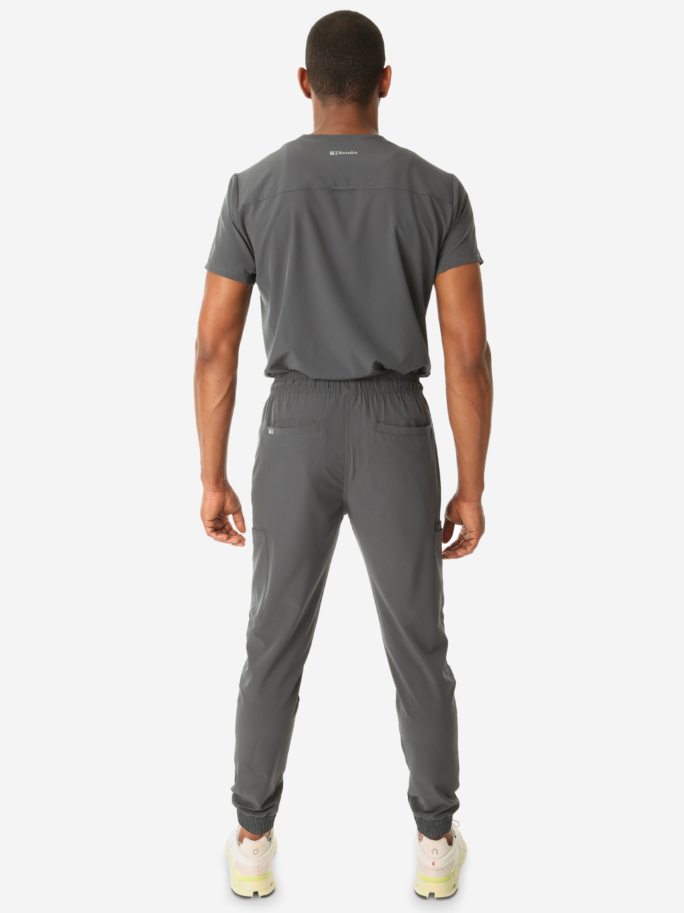 TiScrubs Stretch Charcoal Gray Men&#39;s Jogger Scrub Pants and Double Pocket Top Tucked Full Body Back