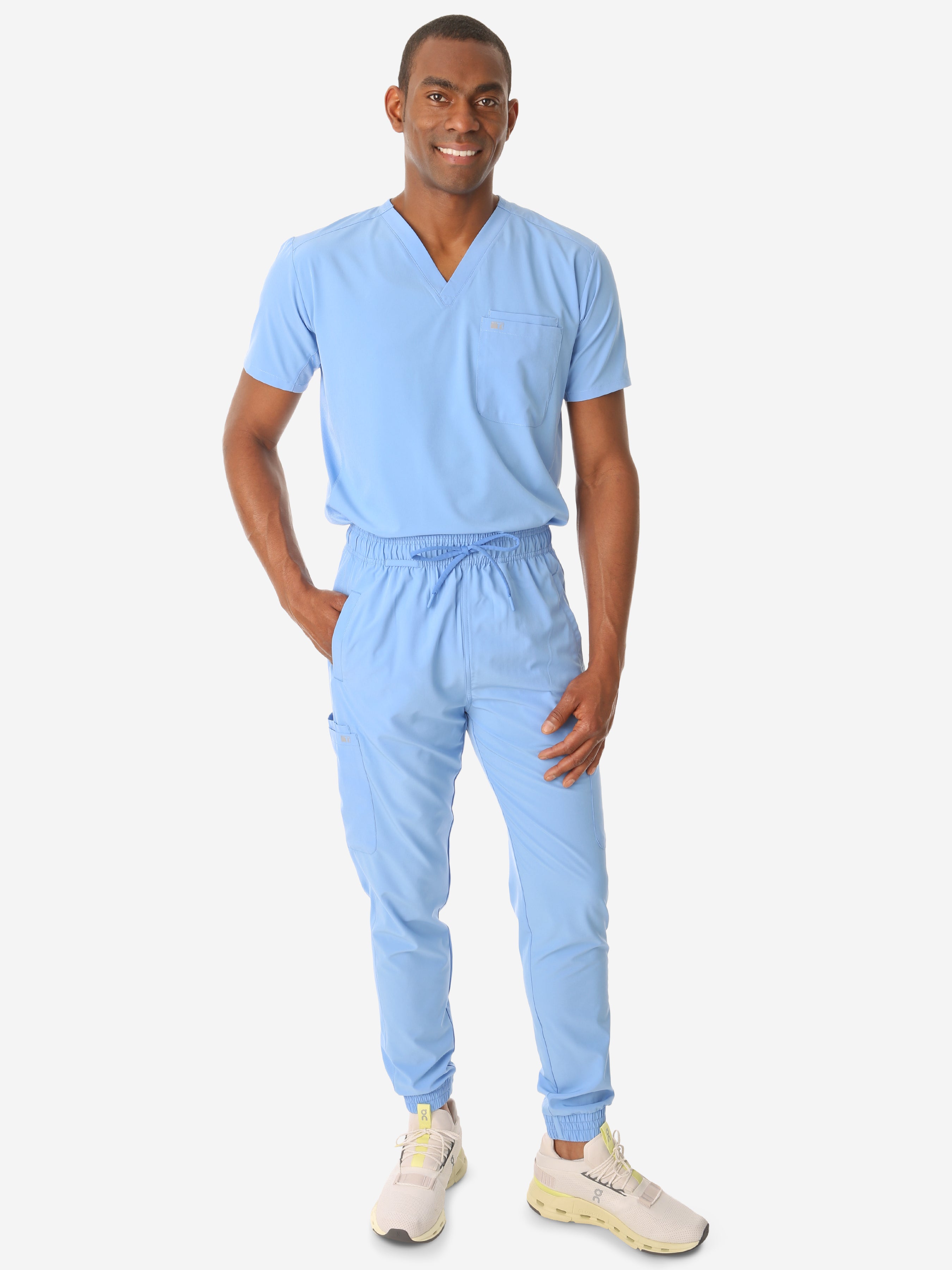 TiScrubs Stretch Men&#39;s Ceil Blue Jogger Scrub and Double-Pocket Top Tucked Full Body Front