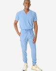 TiScrubs Men's Ceil Blue Double-Pocket Scrub Top Tucked and Joggers Full Body Front