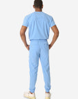 TiScrubs Men's Ceil Blue Double-Pocket Scrub Top Tucked and Joggers Full Body Back