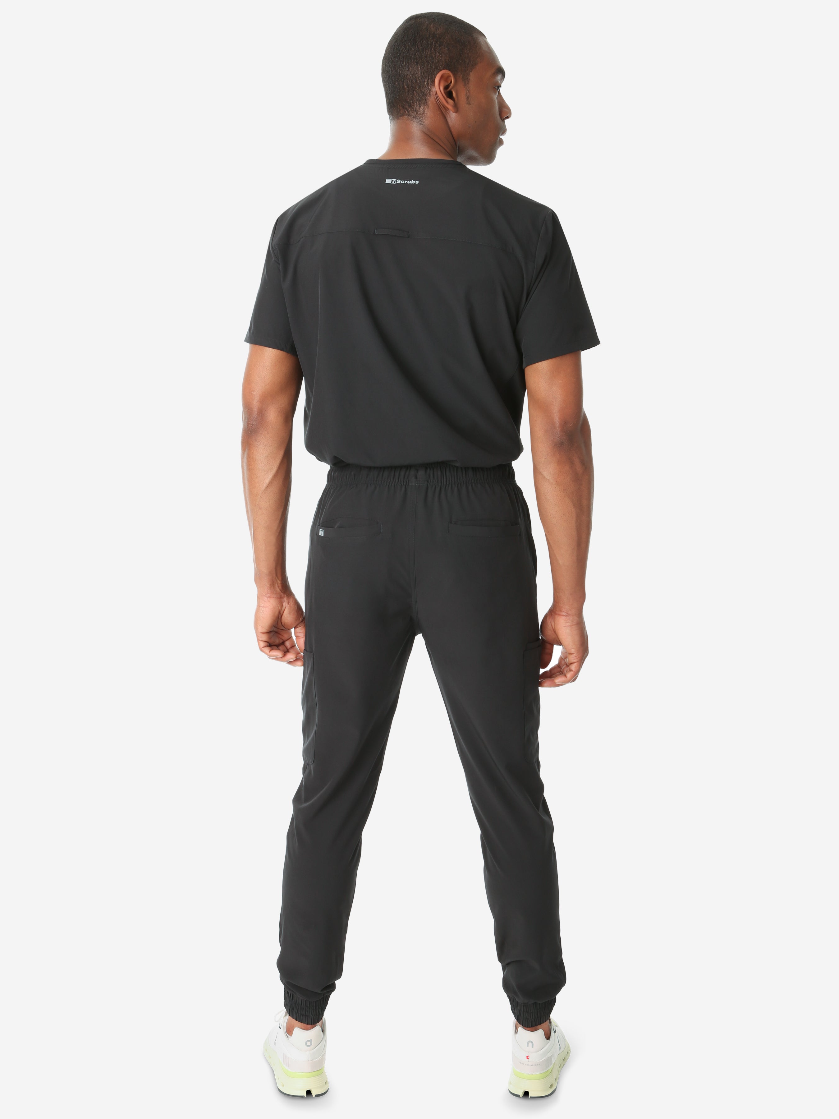TiScrubs Stretch Real Black Jogger Scrub Pants and Double Pocket Top Tucked Full Body Back