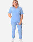 TiScrubs Women's Ceil Blue Stash-Pocket Scrub Top + 9-Pocket Pants Full Body Front