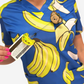 Gone Bananas Women's Scrub Top with Badge Reel