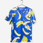 Men's Banana Print Scrub Top in Royal Blue chest pocket