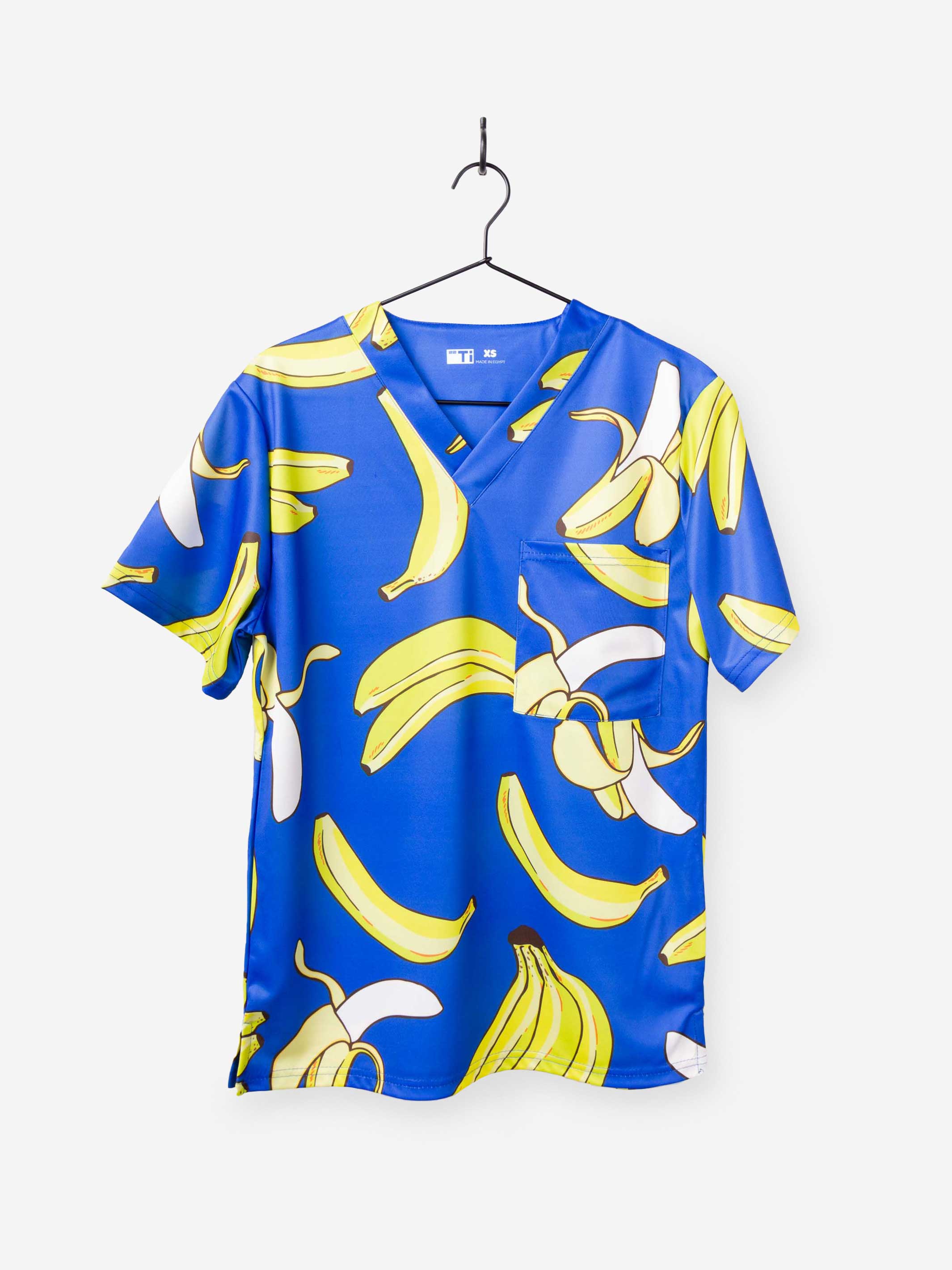 Men&#39;s Banana Print Scrub Top in Royal Blue chest pocket