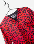 Men's NFLPA Tyreek Hill Print Scrub Top with Cheetah Pattern in Red with chest pocket