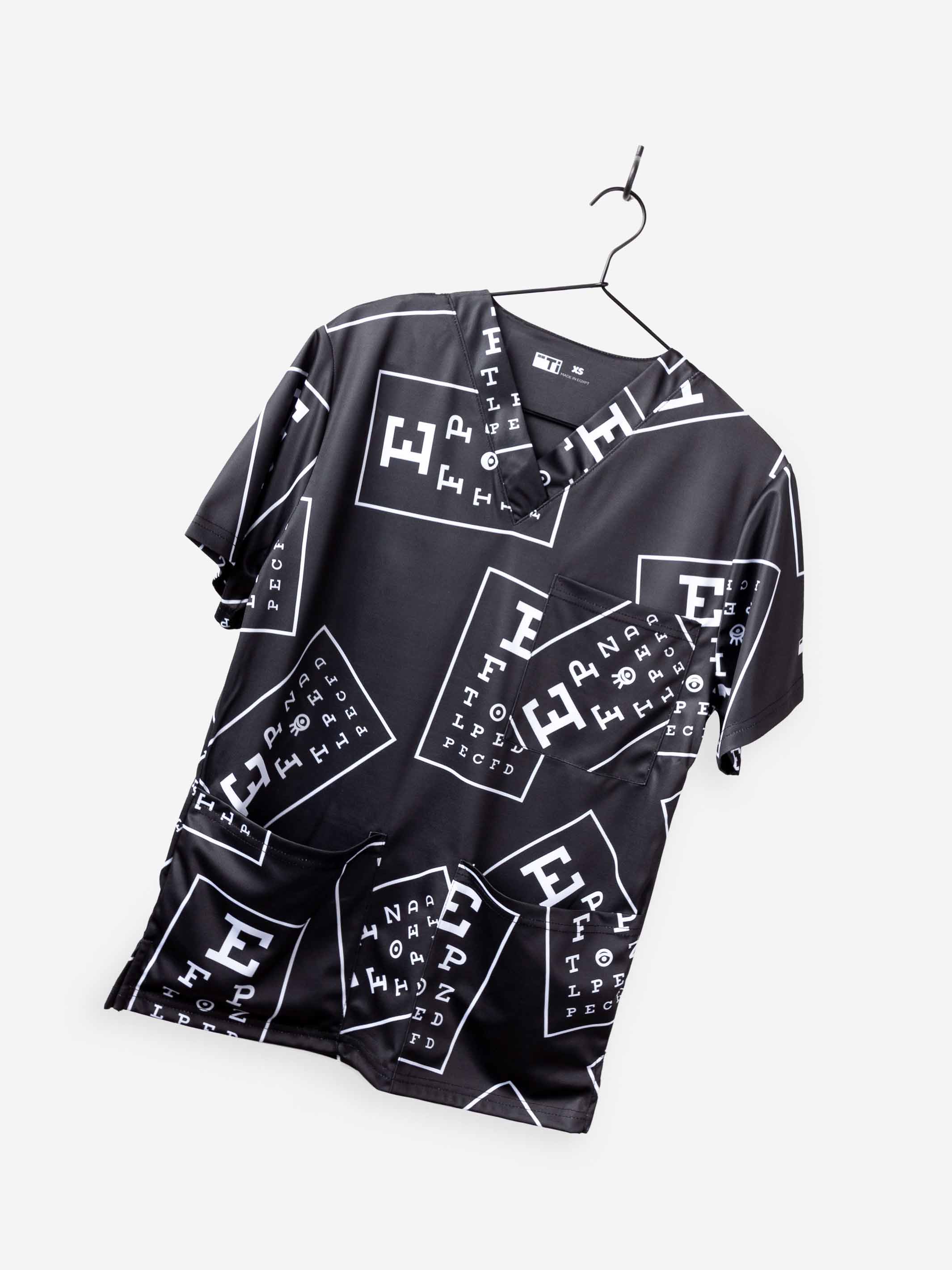 ophthalmology print scrub top black with white eye charts stretch fabric