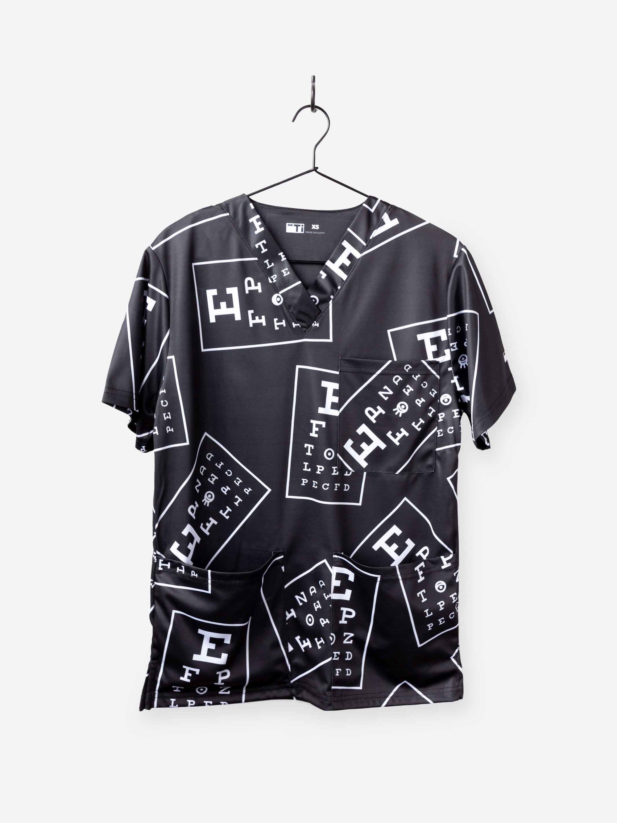 ophthalmology print scrub top black with white eye charts and 3 pockets
