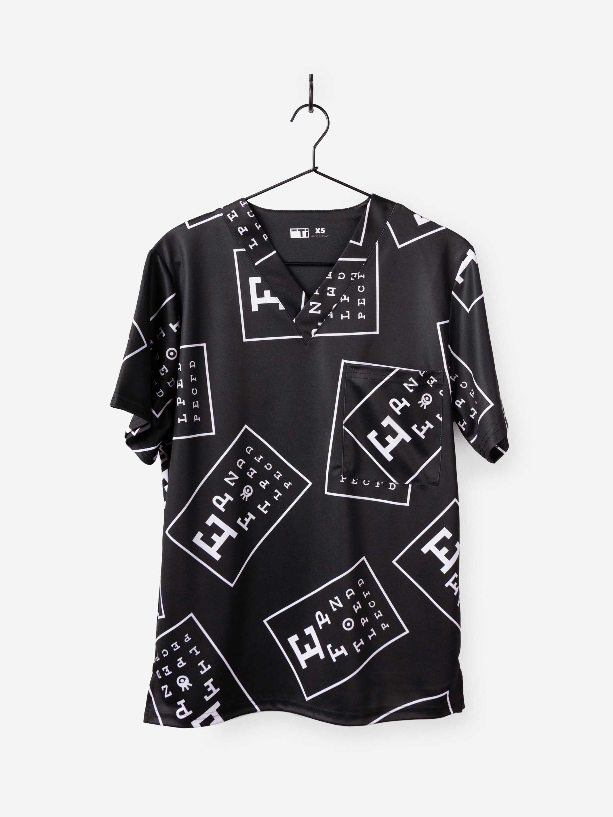 ophthalmology print scrub top black with white eye charts one pocket