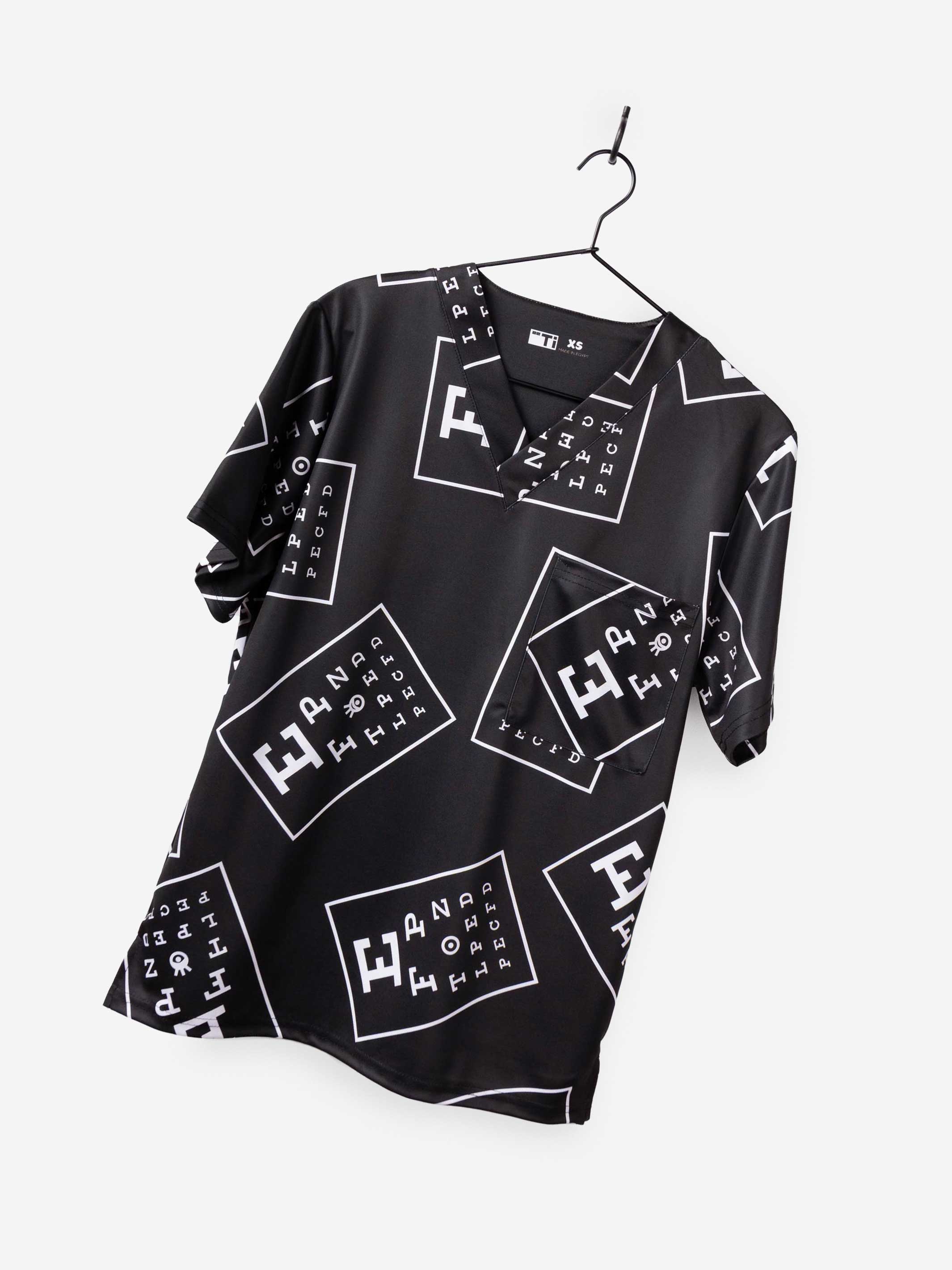 ophthalmology print scrub top black with white eye charts detail