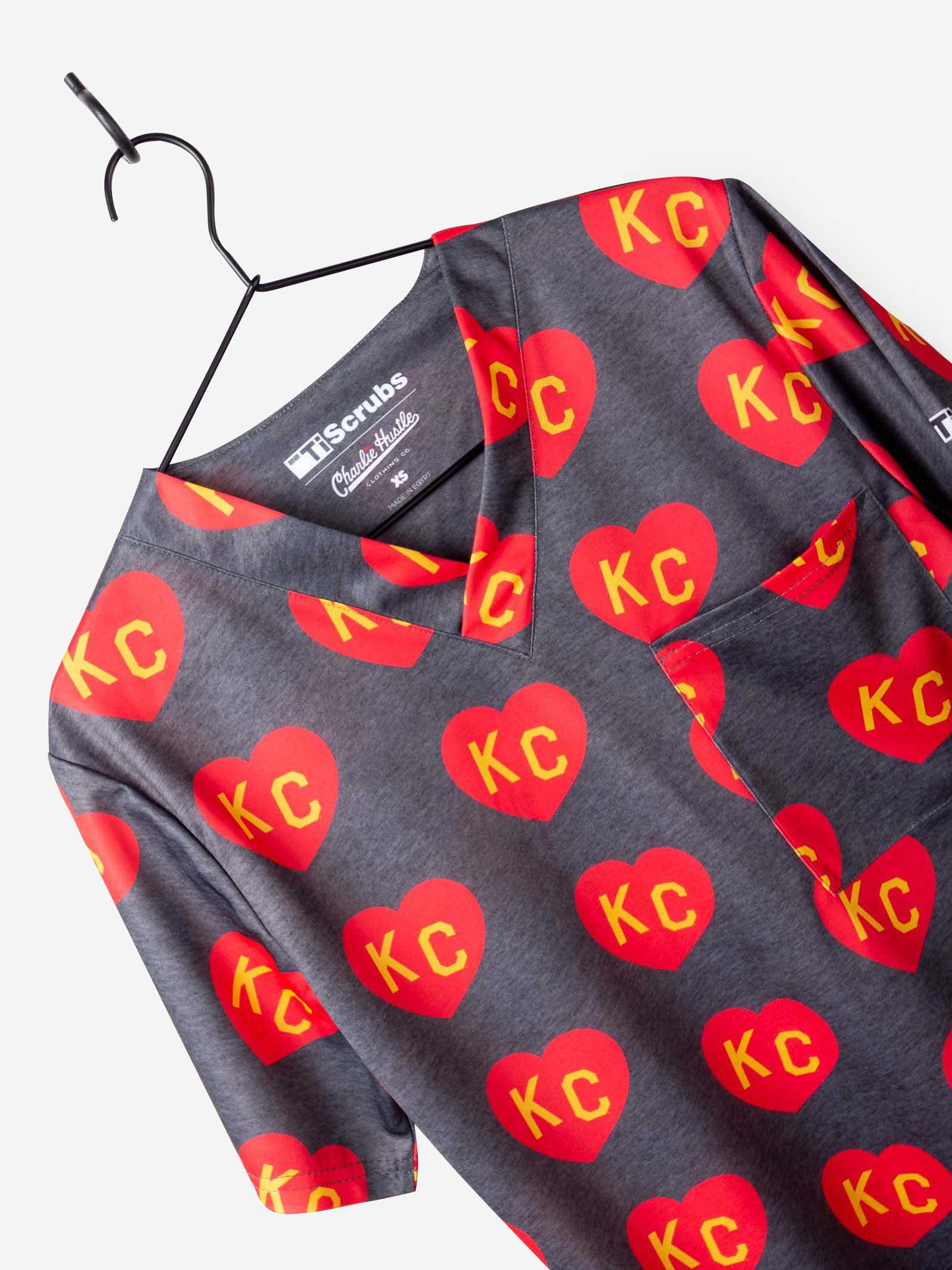 Men&#39;s Charlie Hustle Print Scrub Top with KC Heart All Over Pattern in Red and Gold and heather gray v-neck