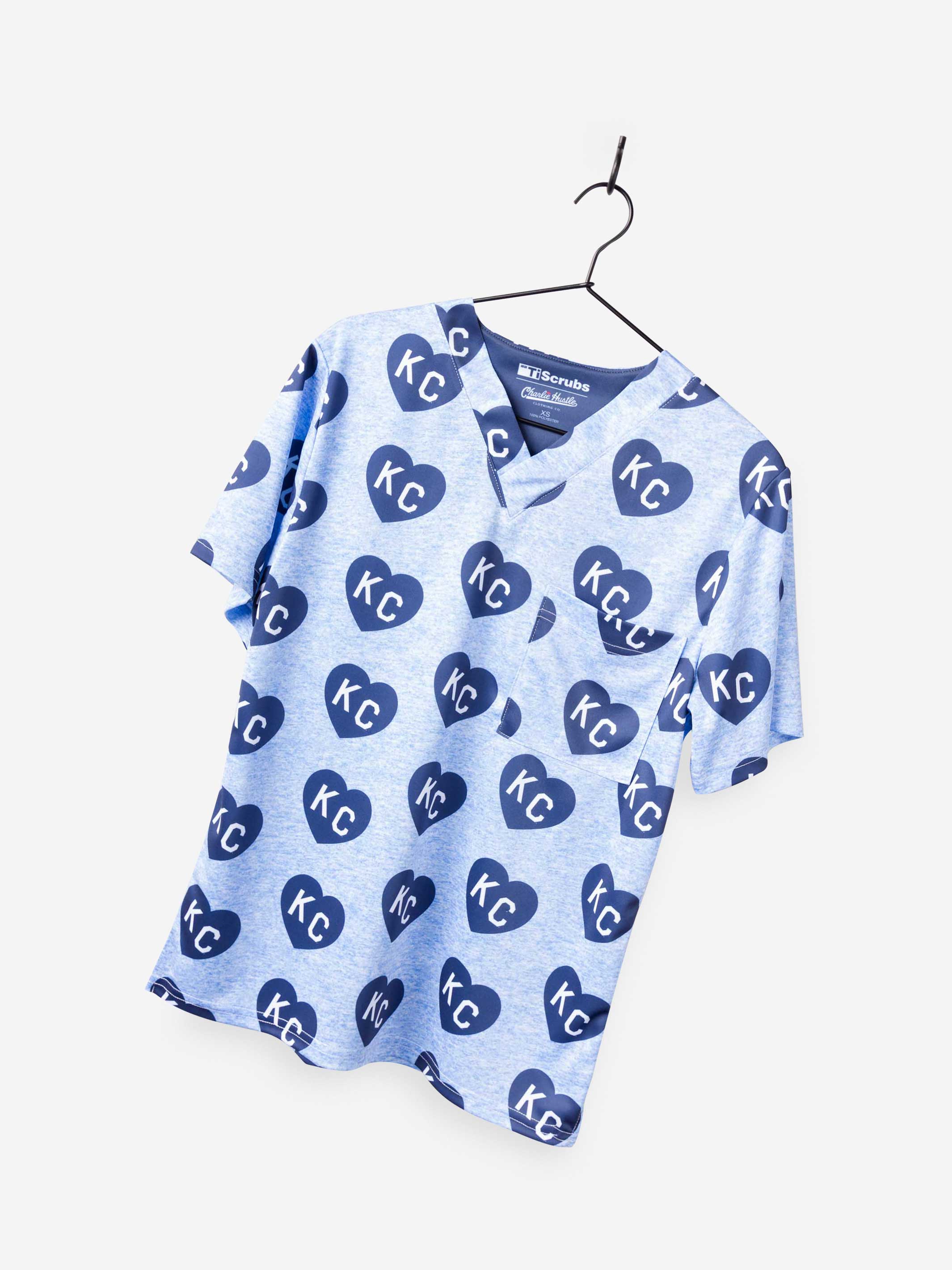 Men&#39;s Charlie Hustle Print Scrub Top with KC Heart All Over Pattern in Navy and Blue on stretch performance fabric