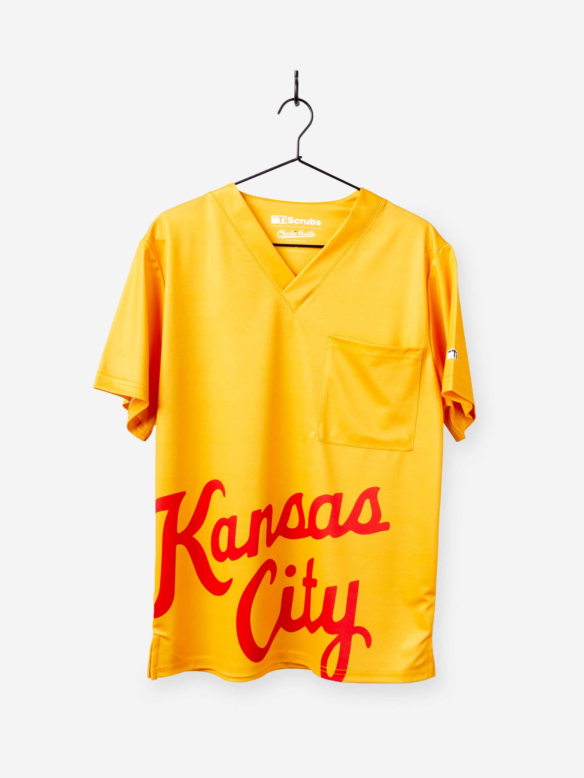 Men&#39;s Charlie Hustle Print Scrub Top with Kansas City Script in Gold and Red with Chest Pocket