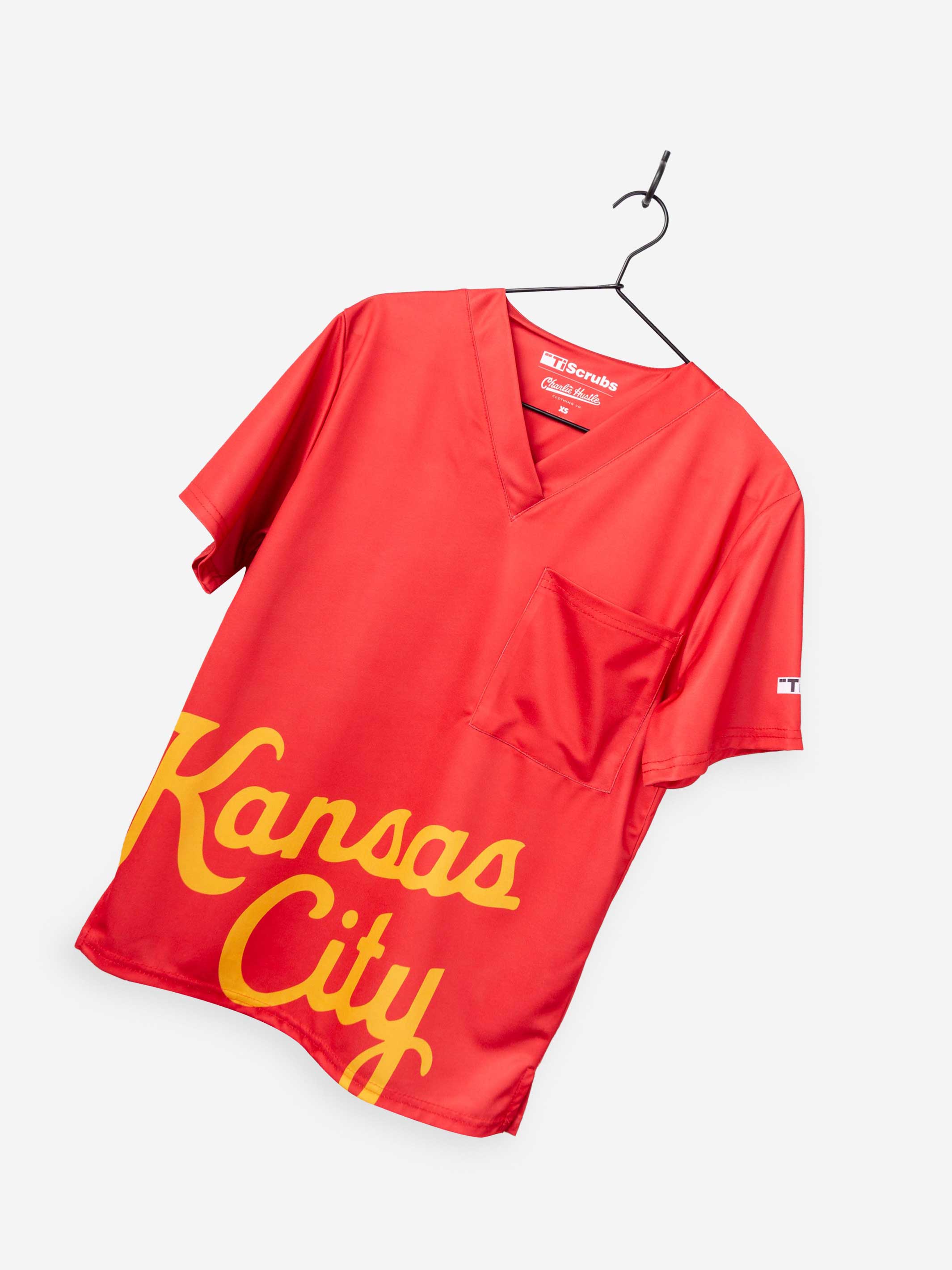 Men&#39;s Charlie Hustle Print Scrub Top with Kansas City Script in Red and Gold in performance stretch fabric