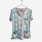 Women's Charlie Hustle Print Scrub Top in Turquoise and Red with 3 Pockets