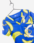 Women's Funny Banana Print Scrub Top Pattern in Royal Blue with chest pocket