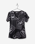 women's ophthalmology print scrub top black with white eye charts chest pocket