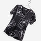 women's ophthalmology print scrub top black with white eye charts vision print