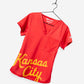 Women's Charlie Hustle Scrub Top with Kansas City Script in Red and Gold with V-neck