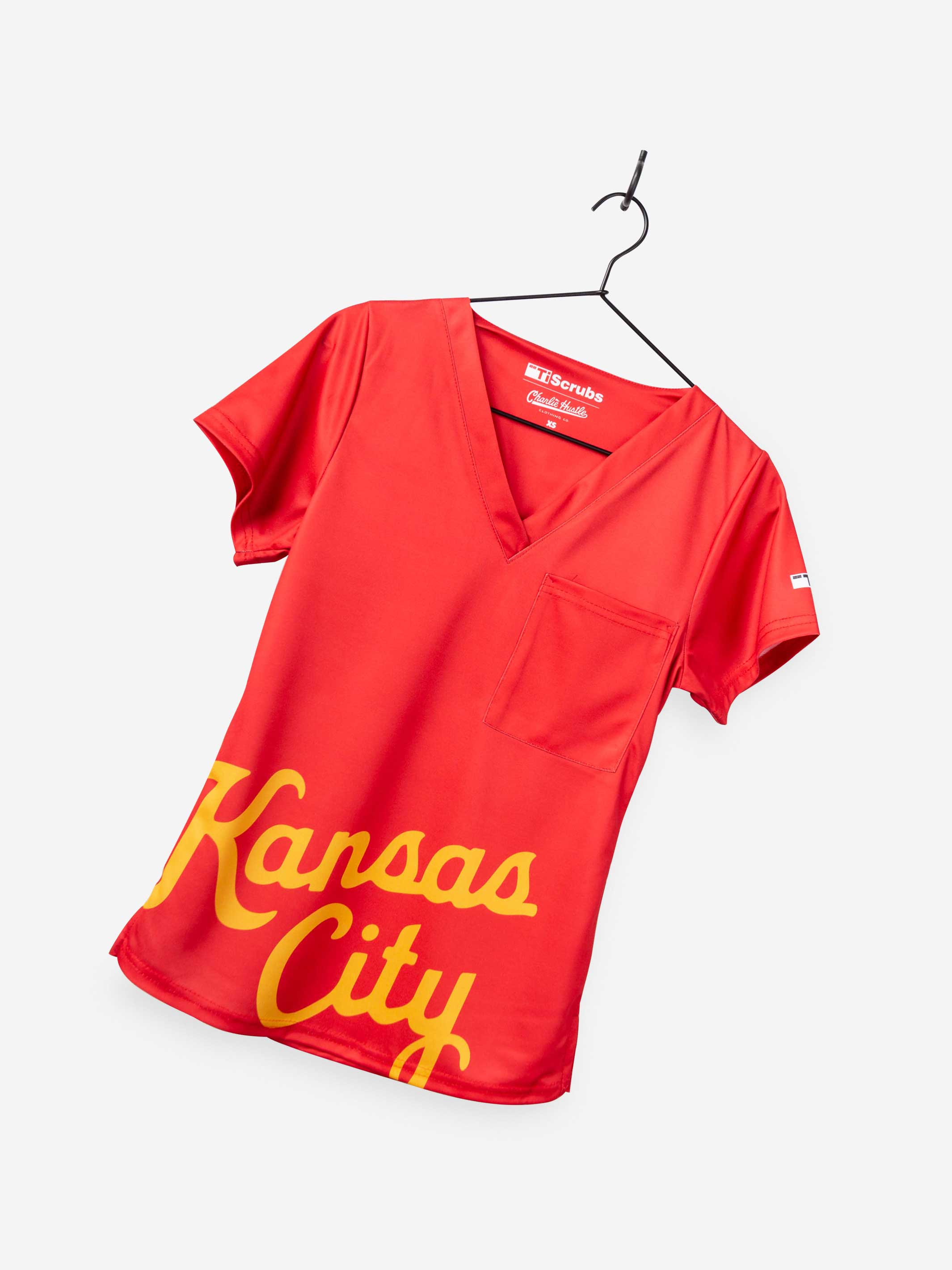 Women&#39;s Charlie Hustle Scrub Top with Kansas City Script in Red and Gold with V-neck