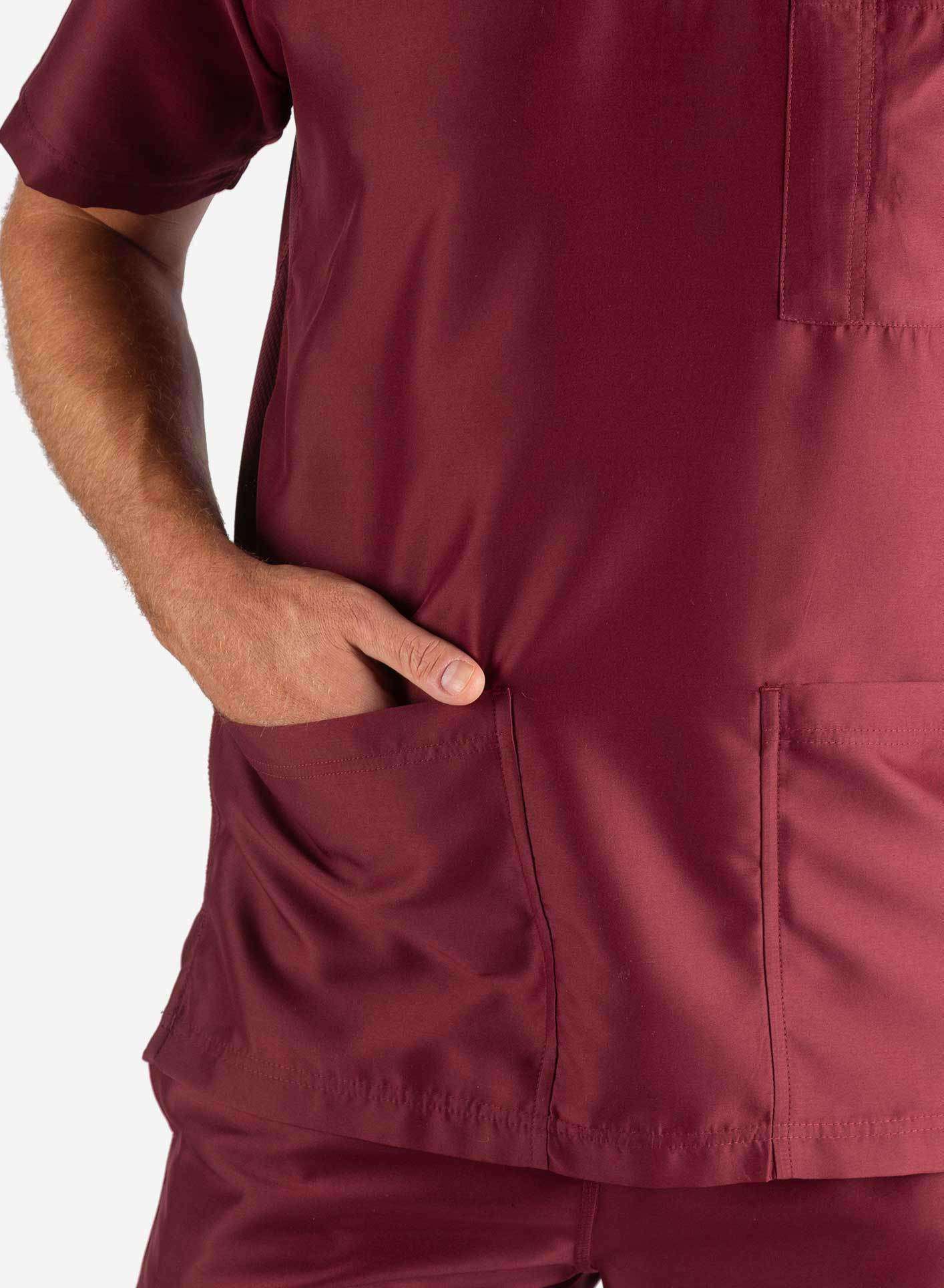 Men&#39;s 3 Pocket Scrub Top in burgundy pocket close up
