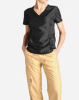 womens short sleeve black scrub top and khaki pants