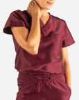 Women's Tuckable Scrub Top in Bold burgundy