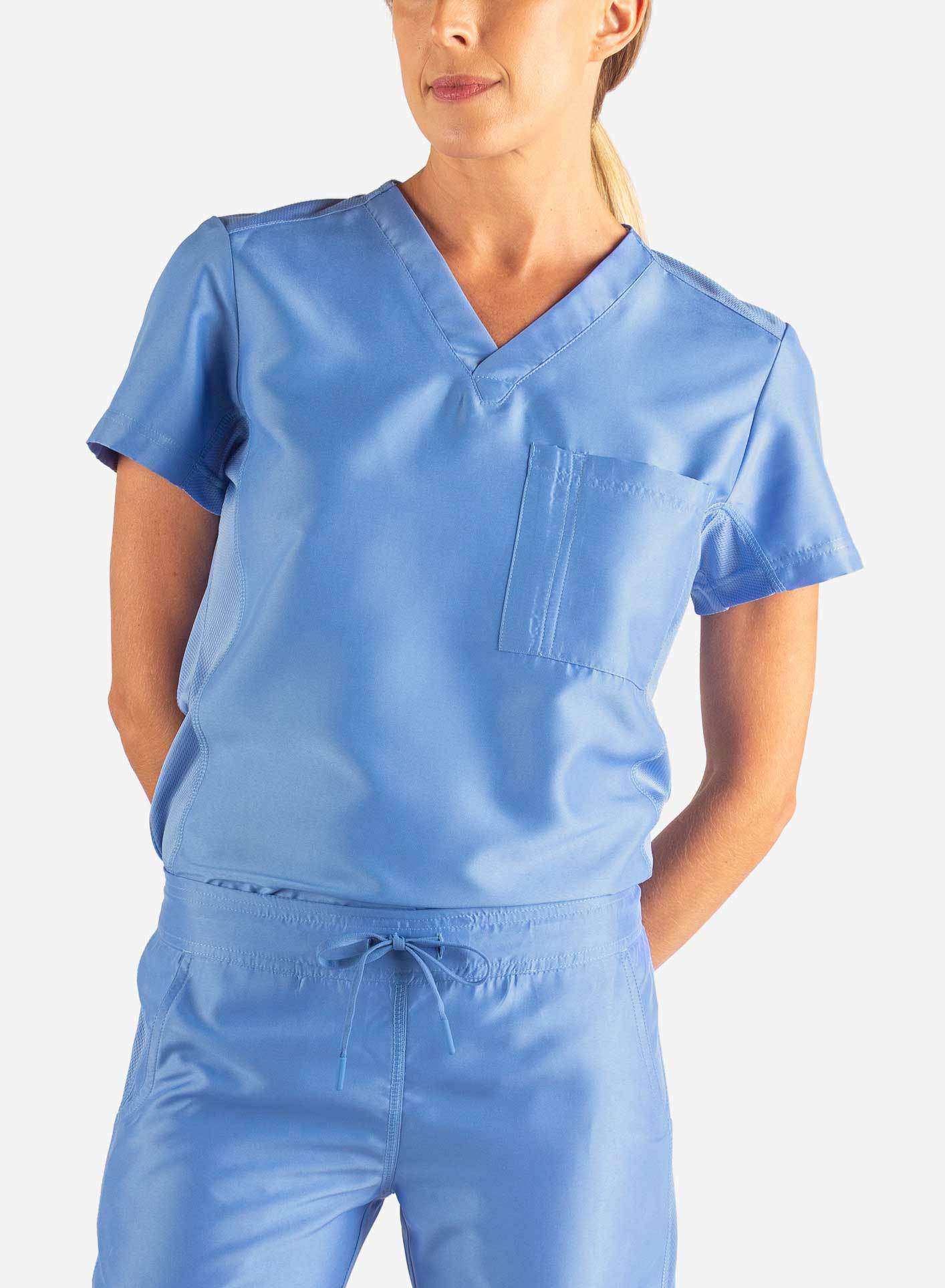 Women's Tuckable Scrub Top in ceil-blue