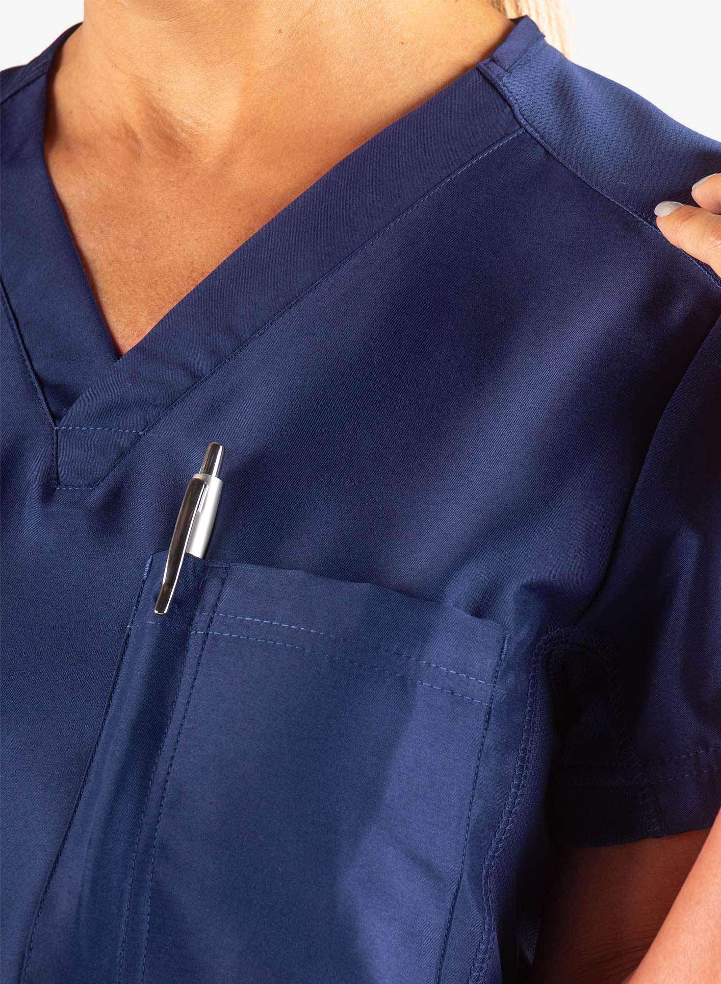 Women&#39;s Tuckable Scrub Top in Navy Blue Chest Pocket